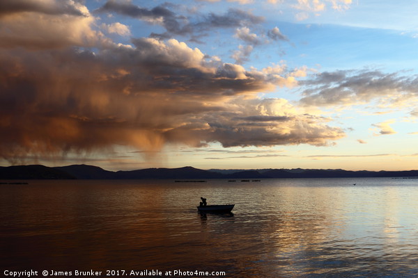 Dramatic Clouds and Fisherman on Lake Titicaca Picture Board by James Brunker