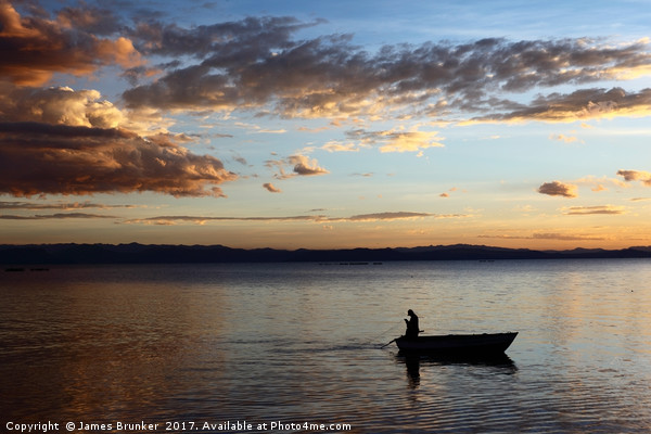 Fishing on Lake Titicaca at Sunset  Picture Board by James Brunker