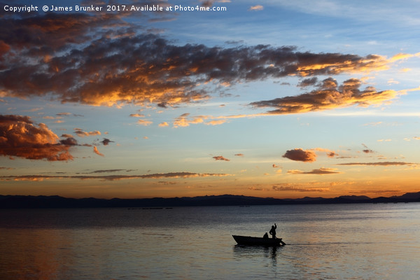 Fishing on Lake Titicaca Under a Fiery Sunset Picture Board by James Brunker