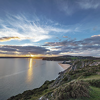 Buy canvas prints of JoEvans Line of Sunlight at Three Cliffs Bay by Jo Evans
