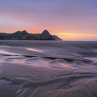 Buy canvas prints of Sunrise, Three Cliffs Bay, Gower Peninsula by Neil Holman