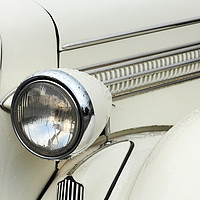 Buy canvas prints of headlamp of vintage car by Gennady Kurinov