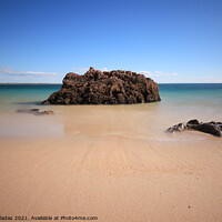 Buy canvas prints of Sandy Beach with turquoise sea water with rocks. l by nuno valadas