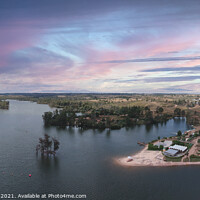 Buy canvas prints of Aerial view from a lake with a beach at the sunset. by nuno valadas