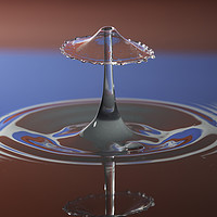 Buy canvas prints of water drop collision in red white and blue by Paul Allen