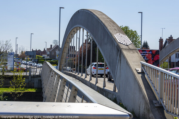 A modern steel road bridge over the river Aon Picture Board by Joy Walker