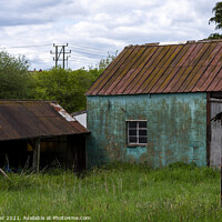 Buy canvas prints of A window in an old barn which is abandoned and falling down by Joy Walker