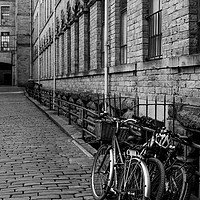 Buy canvas prints of A black and white image of Salts Mill, Saltaire by Ros Crosland