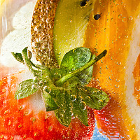 Buy canvas prints of A strawberry, orange, kiwi and lemon cocktail by Phil MacDonald