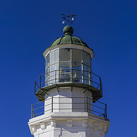 Buy canvas prints of Deserted lighthouse against blue background. by Theocharis Charitonidis