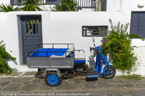 Motor tricycle parked against whitewashed house. Picture Board by Theocharis Charitonidis