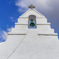 Buy canvas prints of Bell tower at a Greek island against blue sky. by Theocharis Charitonidis