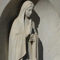 Buy canvas prints of Cemetery Madonna by Merrimon Crawford