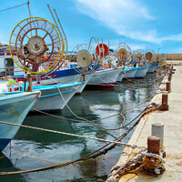 Buy canvas prints of Fishing boats in Paphos harbour  by Philip Openshaw