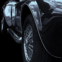 Buy canvas prints of side view of the exhaust and wheels of a rare Vint by Philip Openshaw