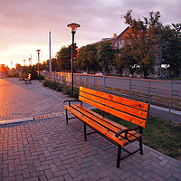 Buy canvas prints of European urban sidewalk, benches and lanterns in t by Vladislav Romensky