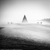 Buy canvas prints of Pyramid Shrouded in Mist  by John Potter