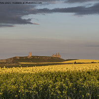 Buy canvas prints of Dunstanburgh Castle just before sunset by Kevin White