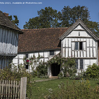 Buy canvas prints of Old English crooked building still standing by Kevin White