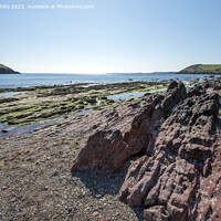 Buy canvas prints of Pure blue skies over Manorbier beach in Pembrokshi by Kevin White