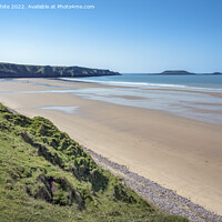 Buy canvas prints of Long sandy beach at Rhossilli by Kevin White
