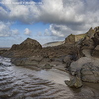 Buy canvas prints of Weather worn rocks at Sandymouth Bay by Kevin White