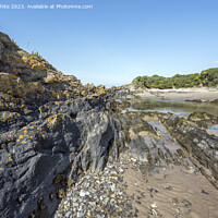 Buy canvas prints of Impressive rocky landscape at Angle Bay beach by Kevin White