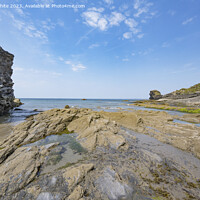 Buy canvas prints of Broadhaven North rugged coastline mixed with large sandy beach by Kevin White