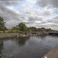 Buy canvas prints of Riverside view towards Molesey Lock near Hampton Court Bridge by Kevin White