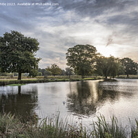 Buy canvas prints of Dramatic mornings in autumn at Bushy Park ponds by Kevin White