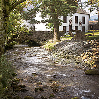 Buy canvas prints of Cottage by stream by Kevin White