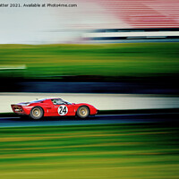 Buy canvas prints of A fast red car on a track. by Peter Hatter