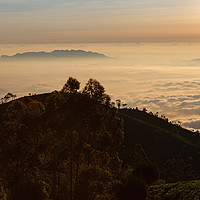 Buy canvas prints of Sunrise over mountains covered with clouds by Łukasz Szczepański