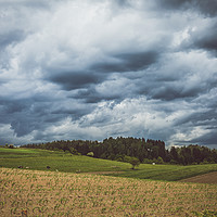 Buy canvas prints of Stormy cloudscape over fields and pasture  by Łukasz Szczepański