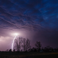 Buy canvas prints of Lightning strike under dramatic cloudy sky  by Łukasz Szczepański