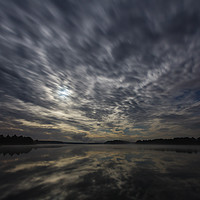 Buy canvas prints of Dynamic clouds in the night over the lake lit by f by Łukasz Szczepański
