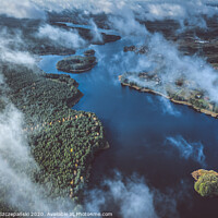 Buy canvas prints of Above the clouds, aerial view of lake and forest by Łukasz Szczepański