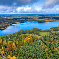 Buy canvas prints of Aerial view of Omulew lake under blue cloudy sky by Łukasz Szczepański