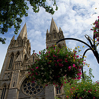Buy canvas prints of Flowers and cathedral, Truro by Linda Cooke