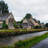 Buy canvas prints of Rainy day in the Cotswolds - Lower Slaughter by Linda Cooke