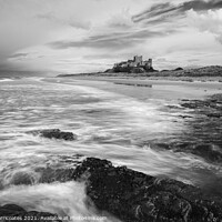Buy canvas prints of Moody Bamburgh Castle by Gary Clarricoates