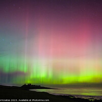 Buy canvas prints of Northern Lights at Dunstanburgh Castle by Gary Clarricoates