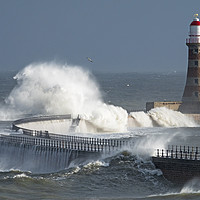 Buy canvas prints of Stormy Waters at Roker Lighthouse by Gary Clarricoates