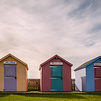 Buy canvas prints of Amble Beach Huts by Gary Clarricoates