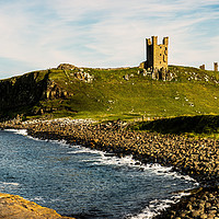 Buy canvas prints of Dunstanburgh in the Afternoon Sun by Gary Clarricoates