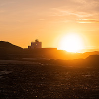 Buy canvas prints of Falling Sun at the Lighthouse by Gary Clarricoates