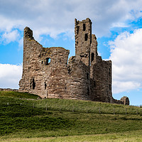 Buy canvas prints of Dunstanburgh Castle by Gary Clarricoates