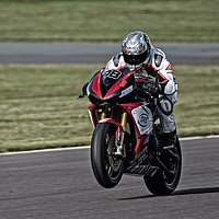 Buy canvas prints of Popping a Wheelie by Brian Sandison