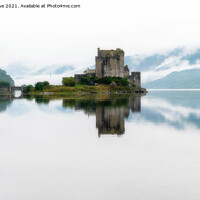 Buy canvas prints of Misty Eilean Donan Castle by Mike Cave
