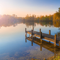 Buy canvas prints of Single jetty on a calm lake by Alan Hill